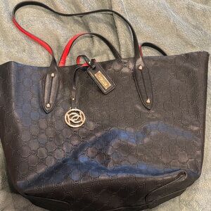 bebe Black Tote with Red Interior Trim and Gold Accent